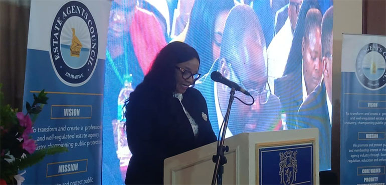 Permanent secretary in the Ministry of Justice, Legal and Parliamentary Affairs, Mrs Vimbai Nyemba speaks on behalf of Minister Ziyambi Ziyambi at the official opening of the Zimbabwe National Land Conference currently underway in Vumba