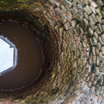 The two children fell into the well while attempting to swim when they were playing together