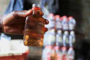 Deadly dollar deals fuel illicit brew crisis