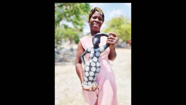 ARTIST USES STONE SCULPTURE TO  RAISE BREAST CANCER AWARENESS