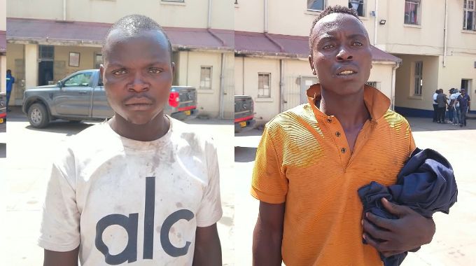 SHOT, CAGED, DOOMED! . . . Norwood shootout robbers remanded as dead accomplice haunts the dock