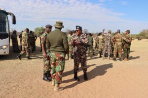 Staff College students arrive at Gwana Primary School for battle site visit