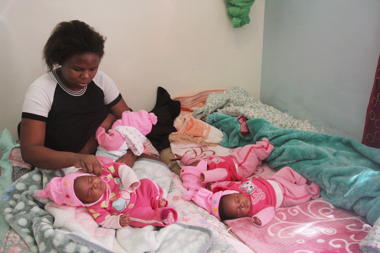 Four is a crowd…Mother of quadruplets makes hospital her home