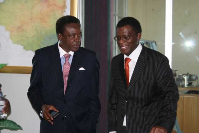 Information and Communication Technology, Postal and Courier Services Minister Webster Shamu with NetOne chief executive Reward Kangai