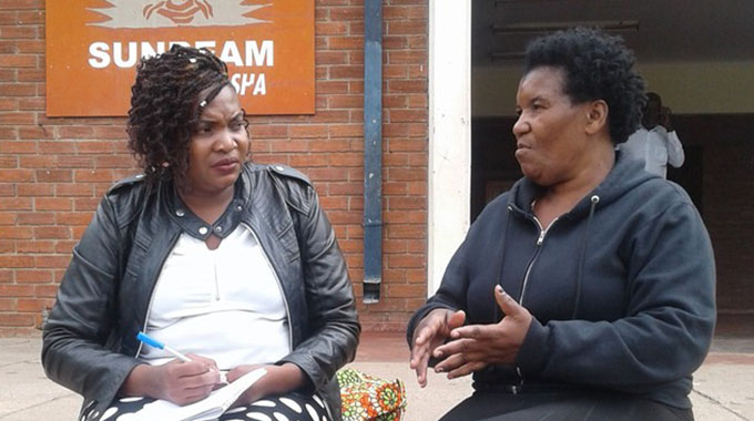 Matogo (right) outside a Glen View hall soon after her advocacy role in HIV awareness chats to Lifestyle reporter Mirirai Nsingo 