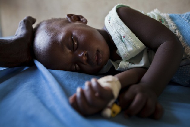 0105-1-1-A YOUNG GIRL WITH MALARIA RESTS IN THE INPATIENT WARD OF A HEALTH CENTRE IN THE SOUTH SUDAN  REUTERS ADRIANE OHANESIAN