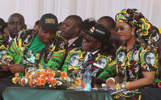 President Mugabe chats with Cde Kudzi Chipanga, while First Lady Amai Grace Mugabe listens