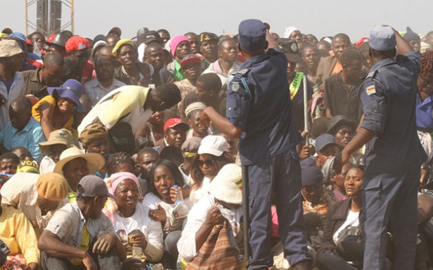 Zimbabwe Republic Police officers manage the bumper crowd