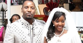 Simba and Bona Chikore pose for a photo during their wedding on Saturday. See more pictures on Page 6- (Picture by Believe Nyakudjara)