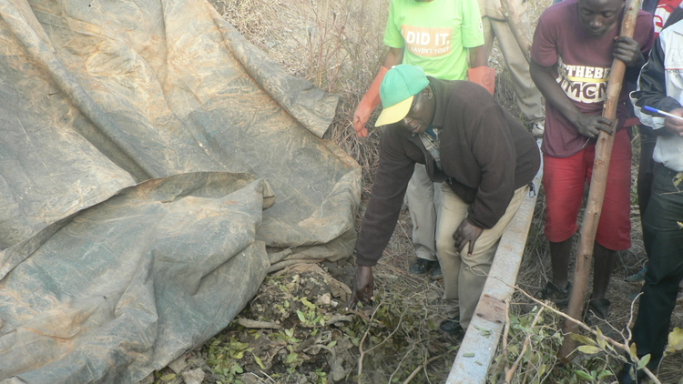 Cde Peter Ngwarati points at some of the remains that were exhumed from Herbert or Guinea Fowl Mine at Old Mutare last Friday