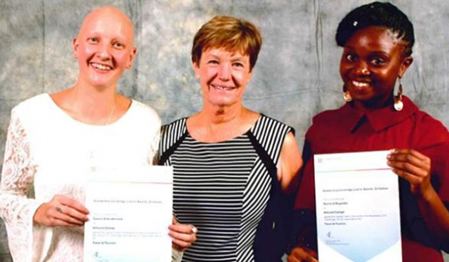 Mrs Anne Holman (center) of Hillcrest College congratulates Rachel Muyambo (right) together with Corralee Hundermark (left) who also attained one of the highest marks acworldwide in Travel and Tourism.