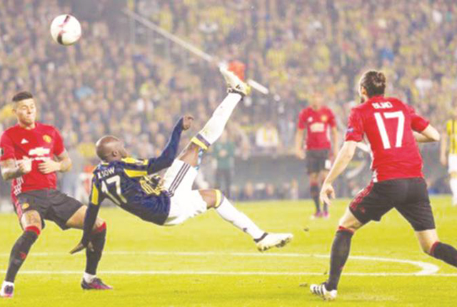 SUPER STUFF…Senegalese international forward Moussa Sow hammers home his overhead kick into the nets, during Fenerbahce’s Europa Cup tie against Manchester United in Istanbul last night, giving the Turkish giants the lead in a match they eventually won 2-1 – The Mirror