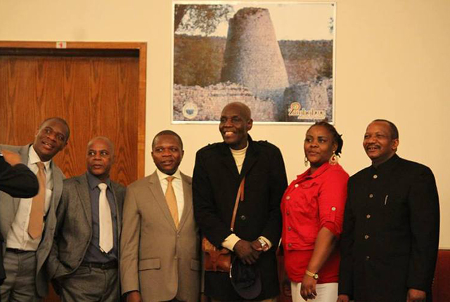 Oliver Mtukudzi flanked by Zimbabwean ambassador to China Paul Chikawa and show organiser Samantha Sibanda