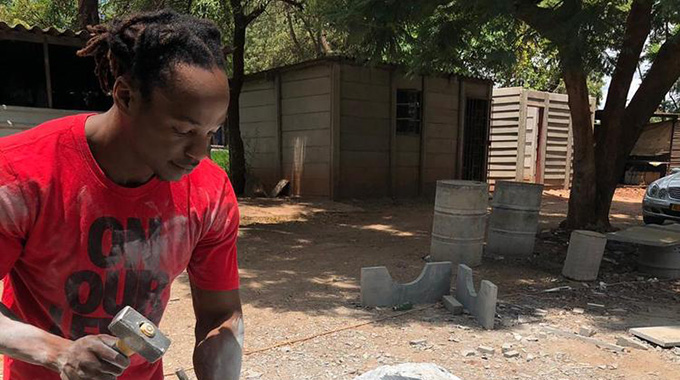 Young sculptor dreams big