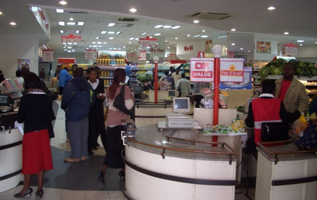 OK Zimbabwe profits slump