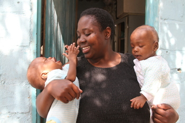 Mrs Agnes Mongoro and her formerly conjoined twins Kupakwashe and Tapiwanashe soon after arriving at their home in Murehwa yesterday— (Picture by Innocent Makawa)