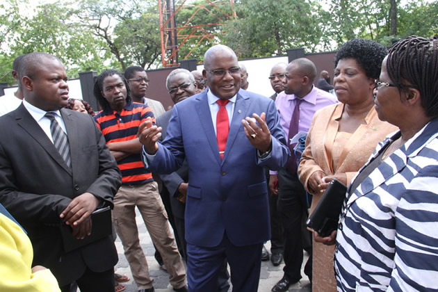 Information, Media and Broadcasting Services Minister Dr Christopher Mushohwe stresses a point to Acting Zimbabwe Broadcasting Corporation Chief Executive Mr Patrick Mavhura (left), Deputy Minister Mrs Thokozile Mathuthu (second from right), Transmedia Chief Executive Mrs Florence Chigudu-Matambo and other staffers during a tour of ZBC Pockets Hill in Harare yesterday. — (Picture by Munyaradzi Chamalimba)