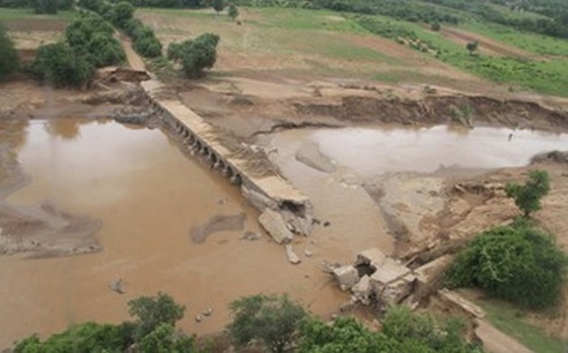 More than 10 people died while school, hospitals, toilets and bridges have been destroyed by the rains that pounded the country in the last few days. This picture collage shows (above left) Piriviri Bridge that connects Hurungwe and Makonde Districts, which was destroyed by floods, and on the right, part of the railway line linking Chinhoyi and Mhangura was damaged by floods near Lions Den recently, cutting supplies of coal and other essential commodities transported by rail to farmers and other businesses in Mhangura area. - Pictures by Tawanda Mudimu