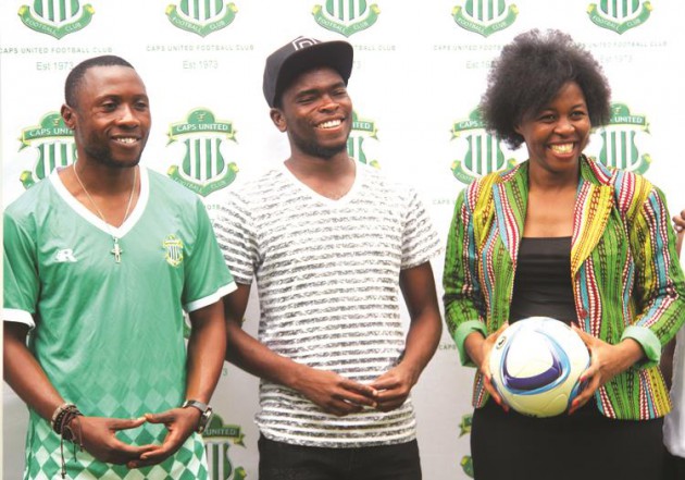 GREEN RAINBOW . . . CAPS United captain Moses Muchenje (centre) and his assistant Hardlife Zvirekwi (left) join Rainbow Airlines marketing executive Dora Manyika on stage at the unveiling of the their partnership in Harare yesterday