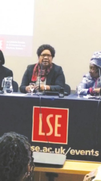 Joice Mujuru addresses delegates at the London School of Economics and Political Sciences recently