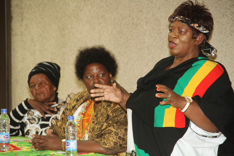 Zanu PF politburo member, Claveria Chizema flanked by Zanu PF's deputy political commissar and Dzivaresekwa MP, Omega Hungwe(second from left) and Cde Mary Chatibura during women`s league meeting in Harare yesterday.-(Picture by Tawanda Mudimu)