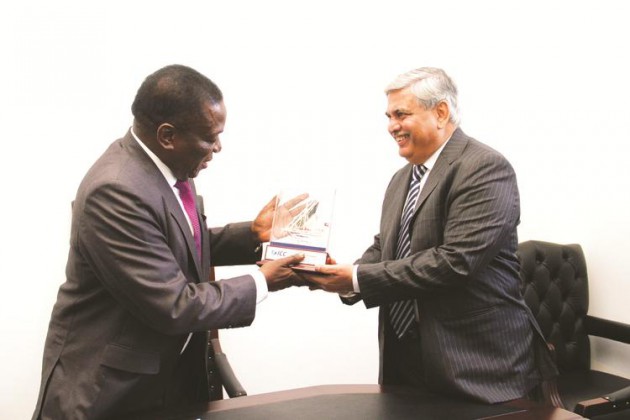 COURTESY CALLS . . . ICC chairman Shashank Manahor shares a lighter moment with Vice President Phelekezela Mphoko (left picture) after a courtesy call in the company of his wife Varsha and Sport and Recreation Minister Makhosini Hlongwane in Harare yesterday while the international cricket boss also met Acting President Emmerson Mnangagwa (right ) at his Munhumutapa offices