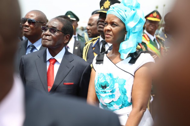 President Mugabe and First Lady Amai Grace Mugabe wait for the arrival of President Xi