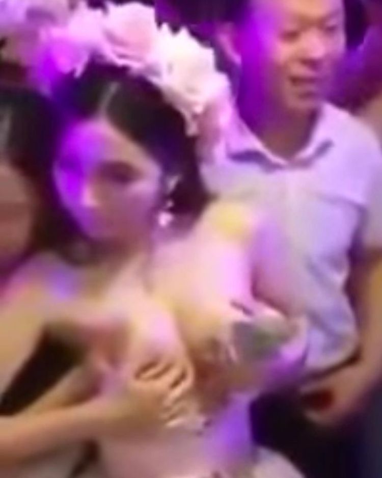 Bride lets guests pull down dress