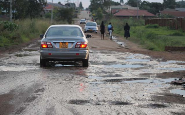 A motorist negotiates his way on one of Harare’s roads recently