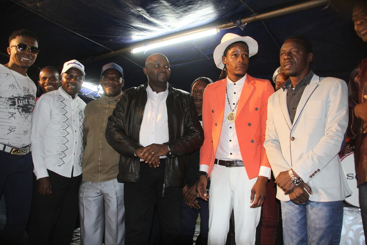 (From left) Dancer Selemani “ Majuice” Mpochi, Leonard “Karikoga” Zhakata, Nicholas “Professor” Zakaria, Daniel Masaiti, Soul Jah Love and Alick Macheso before the cake-cutting ceremony at Tanza Centre on Saturday night