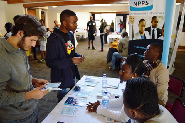 Students interact with career guidance facilitators at the Novus Capitas Career Fair