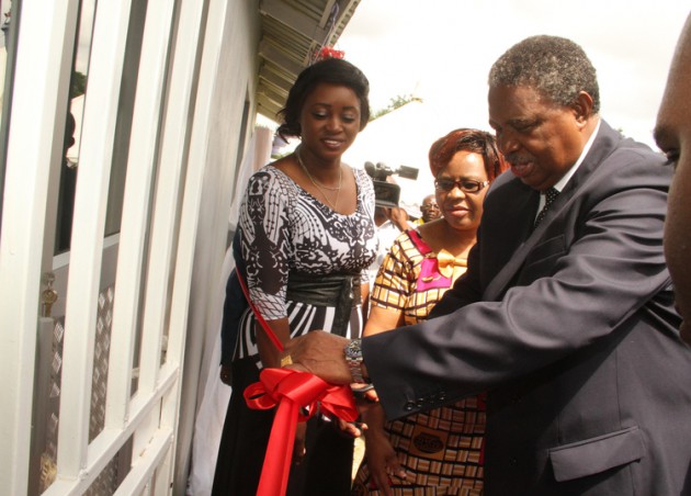 Vice President Phelekezela Mphoko officiates at NewStart Children`s Home Nursery Extension while flanked  Harare Metropolitan Provincial Minister Cde Miriam Chikukwa(centre) and Mrs Farai Breakfast(left)  in Waterfalls, Harare  yesterday.-(Picture by Tawanda Mudimu)