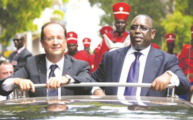 Former French President Francois Hollande with Senegalese President Macky Sall