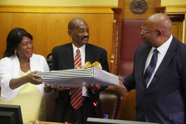 President of the Senate Edna Madzongwe (left) hands over a gift to Cuba Ambassador to Zimbabwe Elio Savon Oliva (centre), while National Assembly speaker Jacob Mudenda looks on, during the launch of the Zimbabwe-Cuba Parliamentary Forum in Harare yesterday. — (Picture by Justin Mutenda)