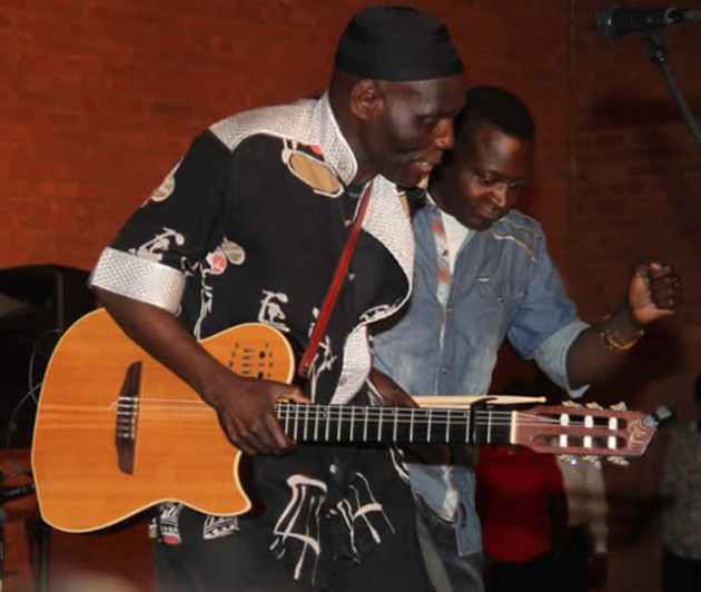 Suluman Chimbetu and Oliver Mtukudzi on stage