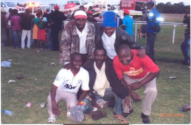 The late Dumisani Mabeka (centre) poses with friends during the Castle Tankard Draw in which he won a Nissan NP300 truck before his unceremonious end on Monday