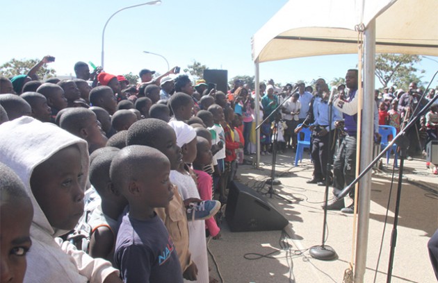 Children watch Suluman Chimbetu perform at Chitungwiza Town Centre last weekend. — (Pictures by Beauty Muchakazi)