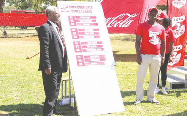 A BLAST FROM THE PAST . . . Former Zimbabwe international forward Kingston Rinemhota (right), who also used the COPA Coca-Cola Tournament as a platform to showcase his talent, was one of the guests who witnessed the launch of this year’s tourney at Rujeko High School 