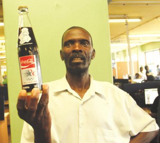 VINTAGE . . . Seasoned long-distance runner Tommy Lazarus displays a bottle of Coca-Cola which was presented to him as one of the participants of the 1984 Los Angeles Summer Olympic Games in the United States where he represented Zimbabwe in the men’s marathon event. Lazarus has kept the bottle for the past 33 years as a souvenir but he now wants to auction it