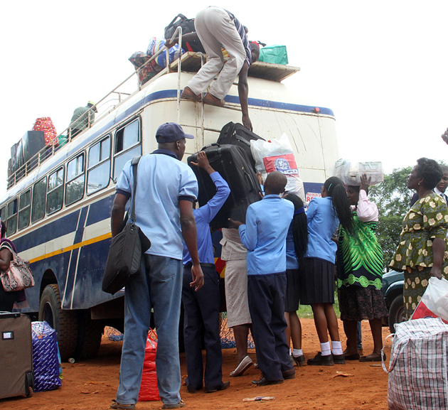 Teachers and Students from Howard High School load their belongings onto a bus in Harare last week before embarking on a journey back to school. — (Picture by Kudakwashe Hunda)