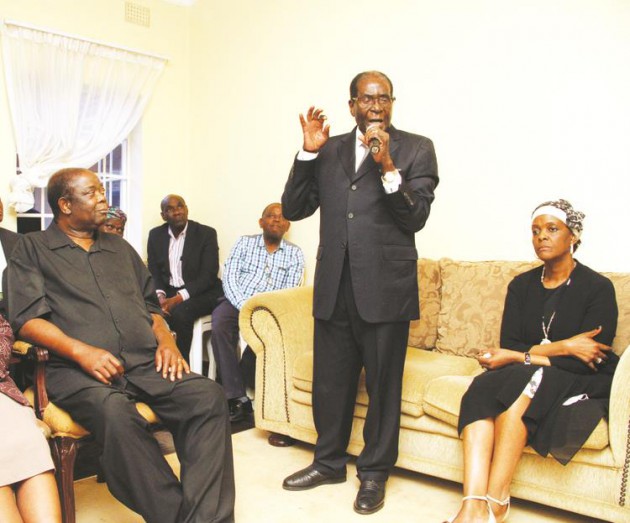President Mugabe, who was accompanied by the First Lady Amai Grace Mugabe, addresses mourners at the funeral of Zimbabwe Open University vice chancellor Professor Primrose Kurasha in Avondale, Harare, on Saturday. Looking on is the vice chancellor’s widower Professor Jameson Kurasha. —(Picture by Tawanda Mudimu)