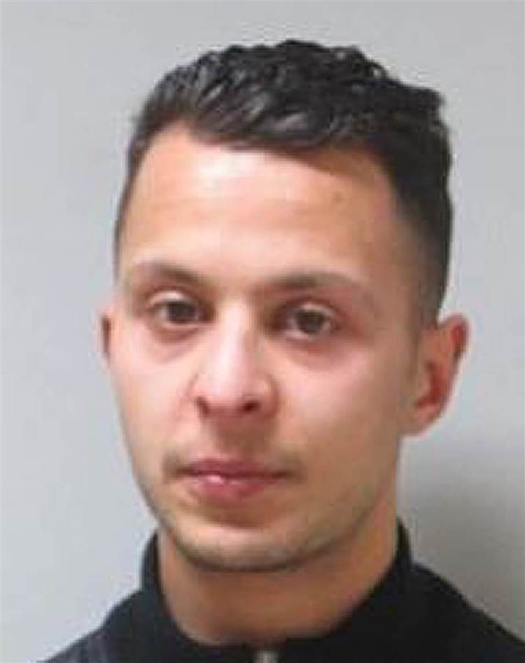 Paris attacks suspect mutes in court