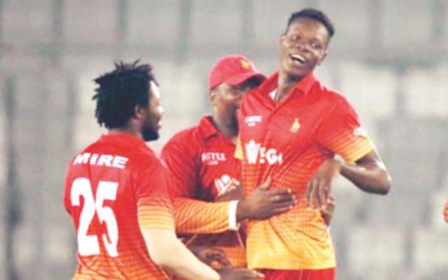 LETS DO THE DANCE . . . Blessing Muzarabani (right) is congratulated by his teammates after taking one of his three wickets yesterday. — Cricinfo