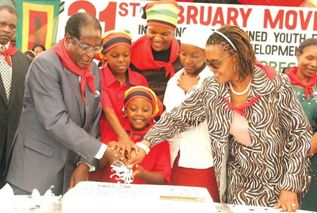 In this file photo, President Mugabe is assisted to cut his birthday cake by the First Lady Amai Grace Mugabe and the First Family. Western media have once again chosen to focus erroneously on the yearly celebrations as drawing from the fiscus