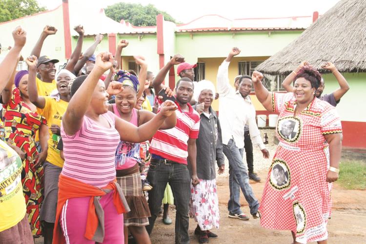 Cde Beauty Chabaya (RIGHT) is joined by Zanu-PF supporters in celebrating her victory at her home in Bikita West constituency yesterday. -Picture by John Manzongo