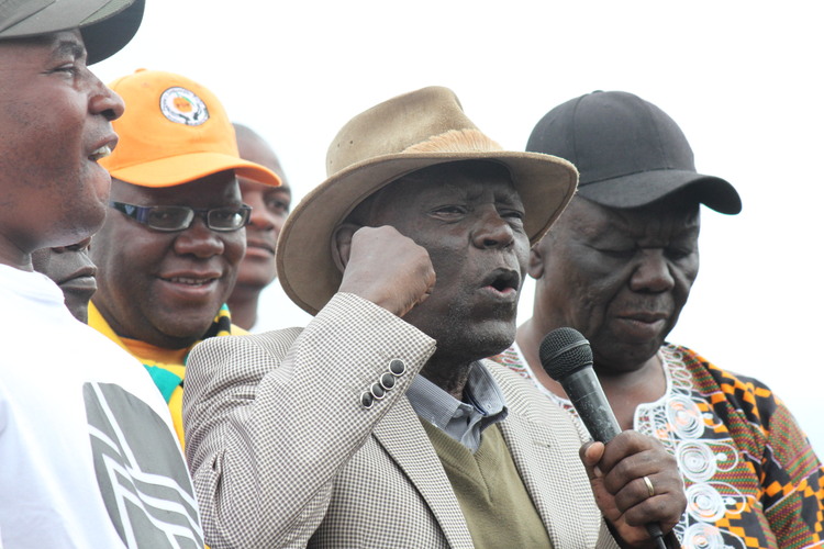 Mr Morgan Tsvangirai (right) and other opposition leaders listen to Mr Didymus Mutasa’s address during a flopped Nera demonstration in Harare yesterday