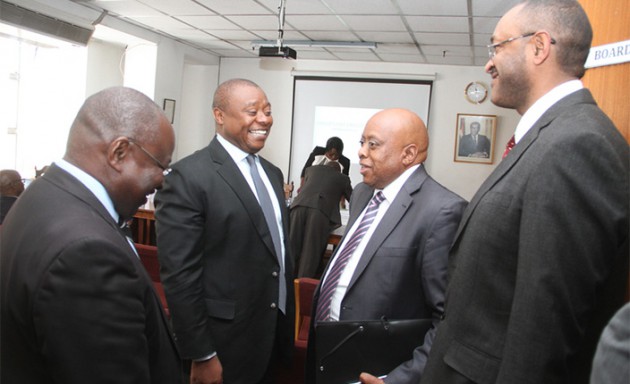 Zimpapers board member Phibion Gwatidzo (left) chats with chief executive Pikirayi Deketeke (second left), board chairman Delma Lupepe (third from left) and board member Terrence Hussein at the company Annual General Meeting yesterday