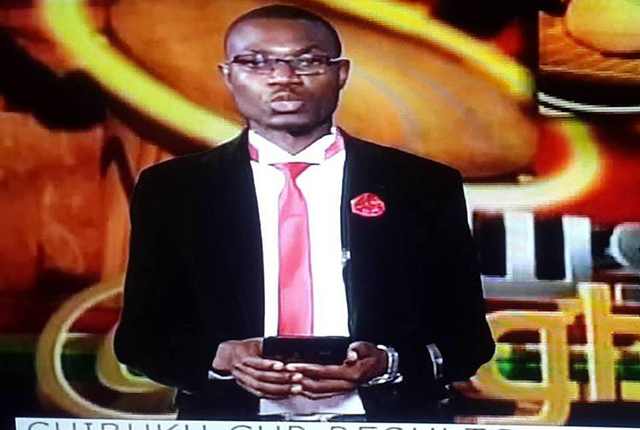 The sports presenter that jumped the broom can be mistaken for a choir director at a football match. Opps! He forgot not only the price tag but to remove the loud label which was screaming for help in the 18 area