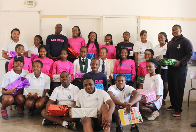 Leo Club members and Shamwari Yemwanasikana pose for a photograph soon after the ceremony
