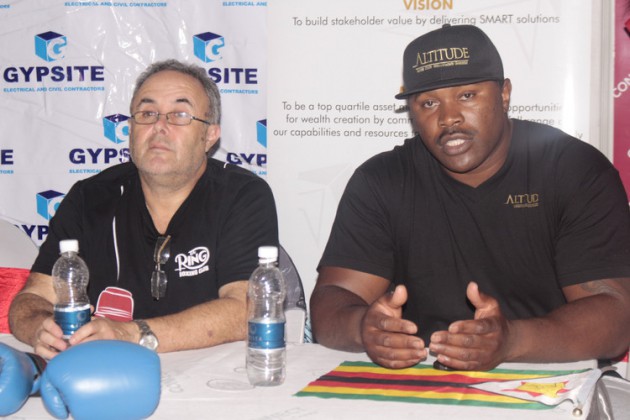 THE BOMBER . . . World Boxing Federation-Africa heavyweight champion Elvis “The Bulawayo Bomber’’ Moyo (right) addresses journalists in Harare yesterday in the company of WBF-Africa president Howard Goldberg ahead of the defence of his crown at the City Sports Centre tomorrow night